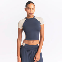 NikeSKIMS MATTE AND SHINE CREWNECK CROP SHORT SLEEVE | DEEP ROYAL/STONE ON A MODEL SIDE VIEW @ | FOCUS: 0.0, 1.0, 0.9