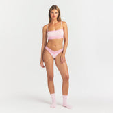 LIGHTWEIGHT COTTON WIDE LACE THONG | CHERRY BLOSSOM TONAL ON A MODEL FRONT VIEW @ | FOCUS: 0.0, 1.0, 0.9