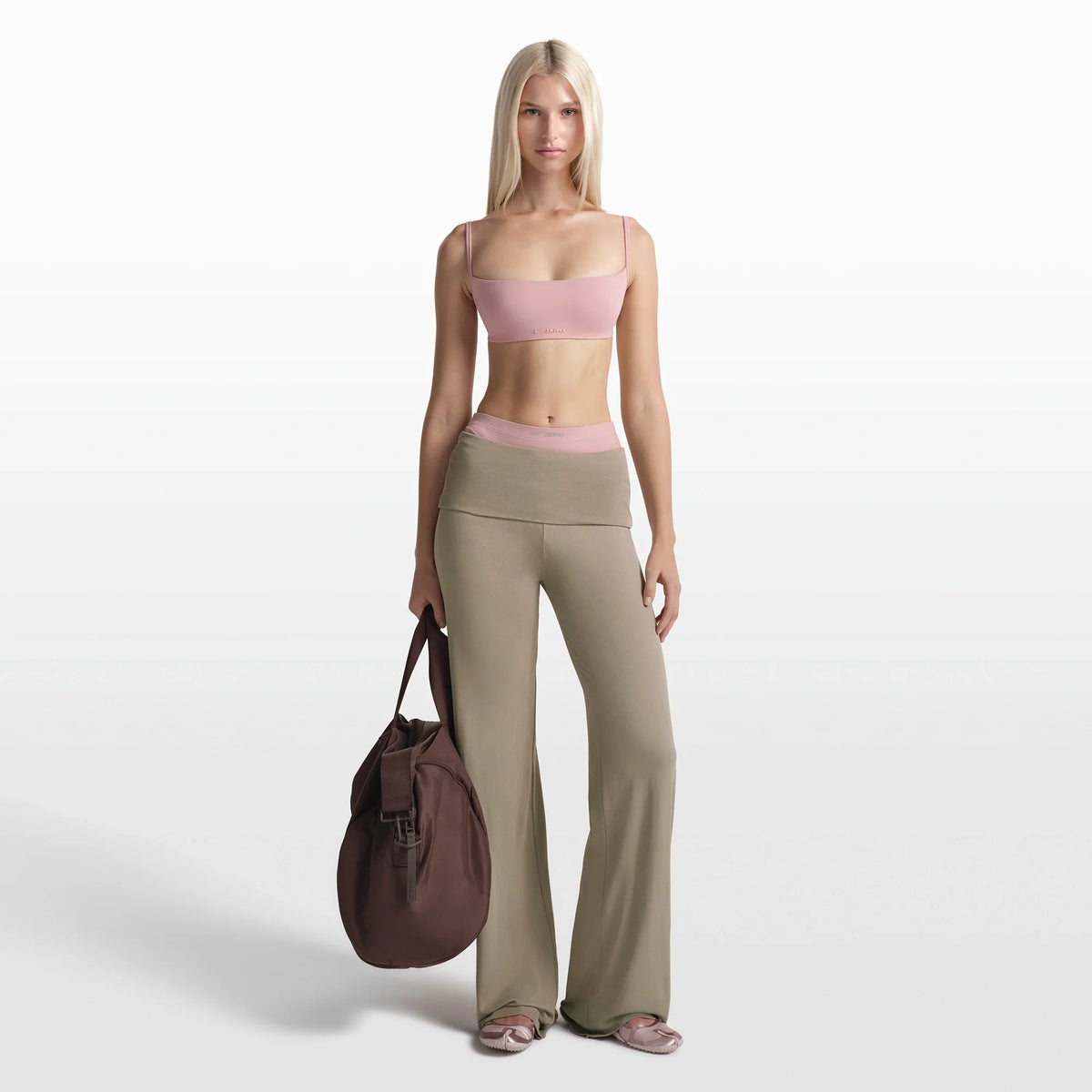 NikeSKIMS MATTE MICRO BRA | HIMALAYAN ON A MODEL FRONT VIEW @ | FOCUS: 0.0, 1.0, 0.9