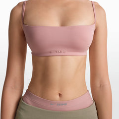 NikeSKIMS MATTE MICRO BRA | HIMALAYAN ON A MODEL FRONT VIEW @ | FOCUS: 0.0, 1.0, 0.9