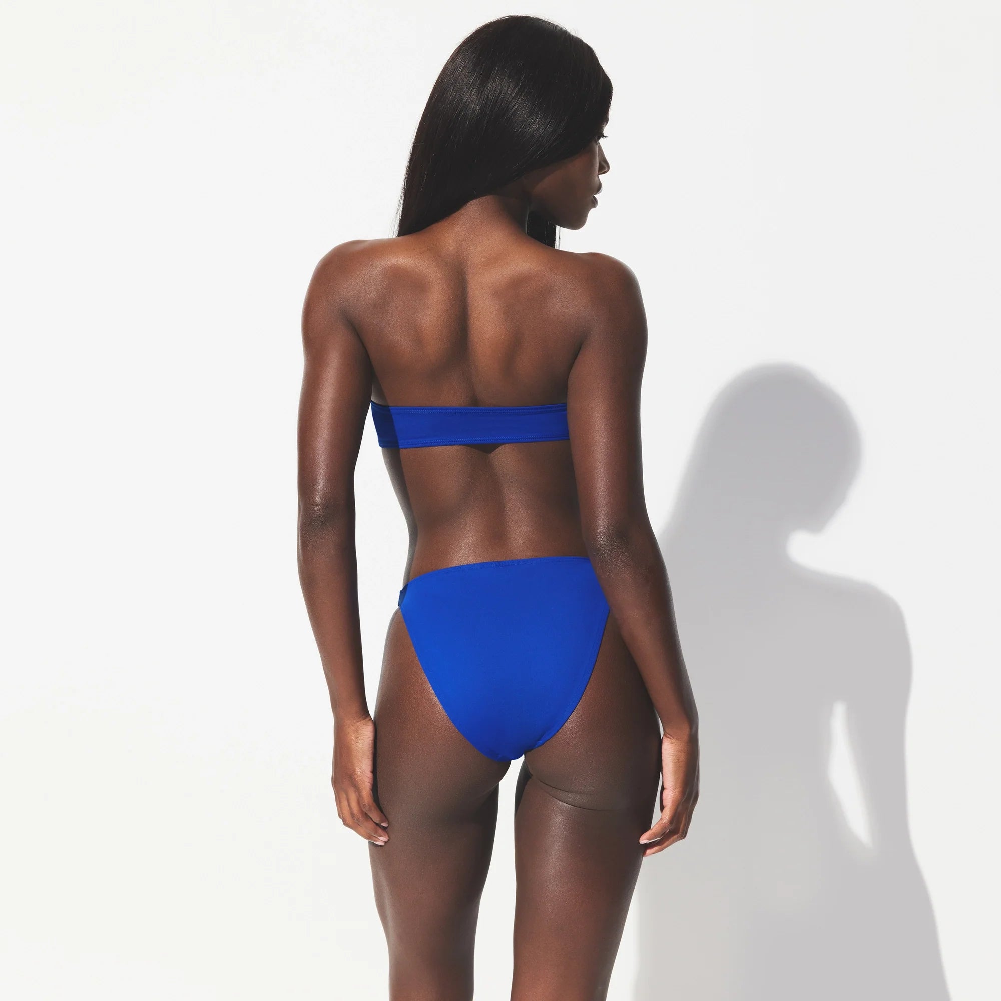 ICONIC SWIM HIGH LEG BIKINI BOTTOM | COBALT ON A MODEL SIDE VIEW @ | FOCUS: 0.0, 1.0, 0.9