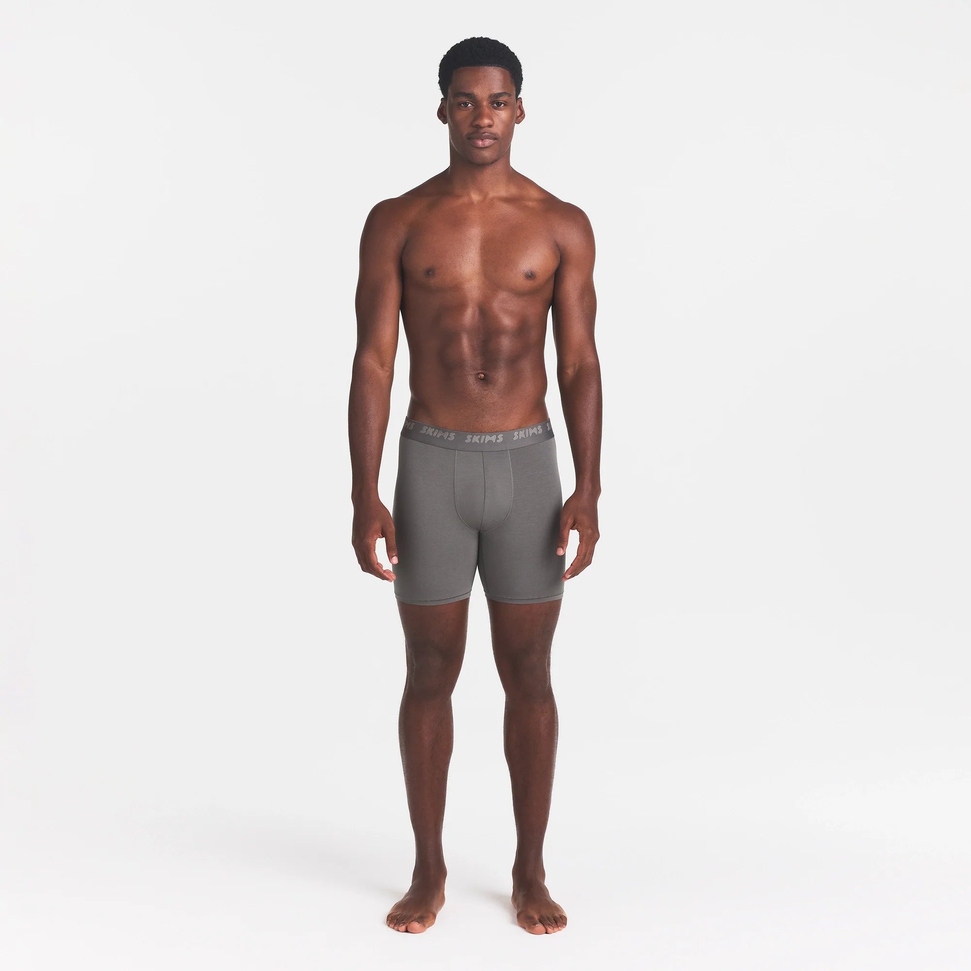 SKIMS STRETCH MENS 5" BOXER BRIEF | GUNMETAL ON A MODEL FRONT VIEW @ | FOCUS: 0.0, 1.0, 0.9