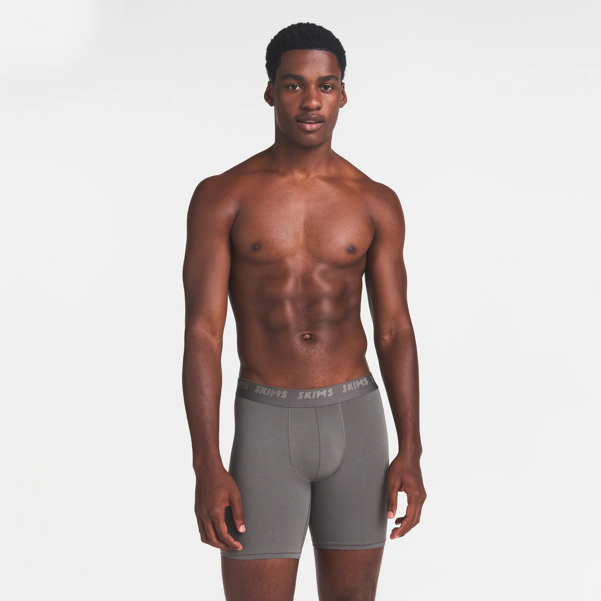 SKIMS STRETCH MENS 5" BOXER BRIEF | GUNMETAL ON A MODEL FRONT VIEW