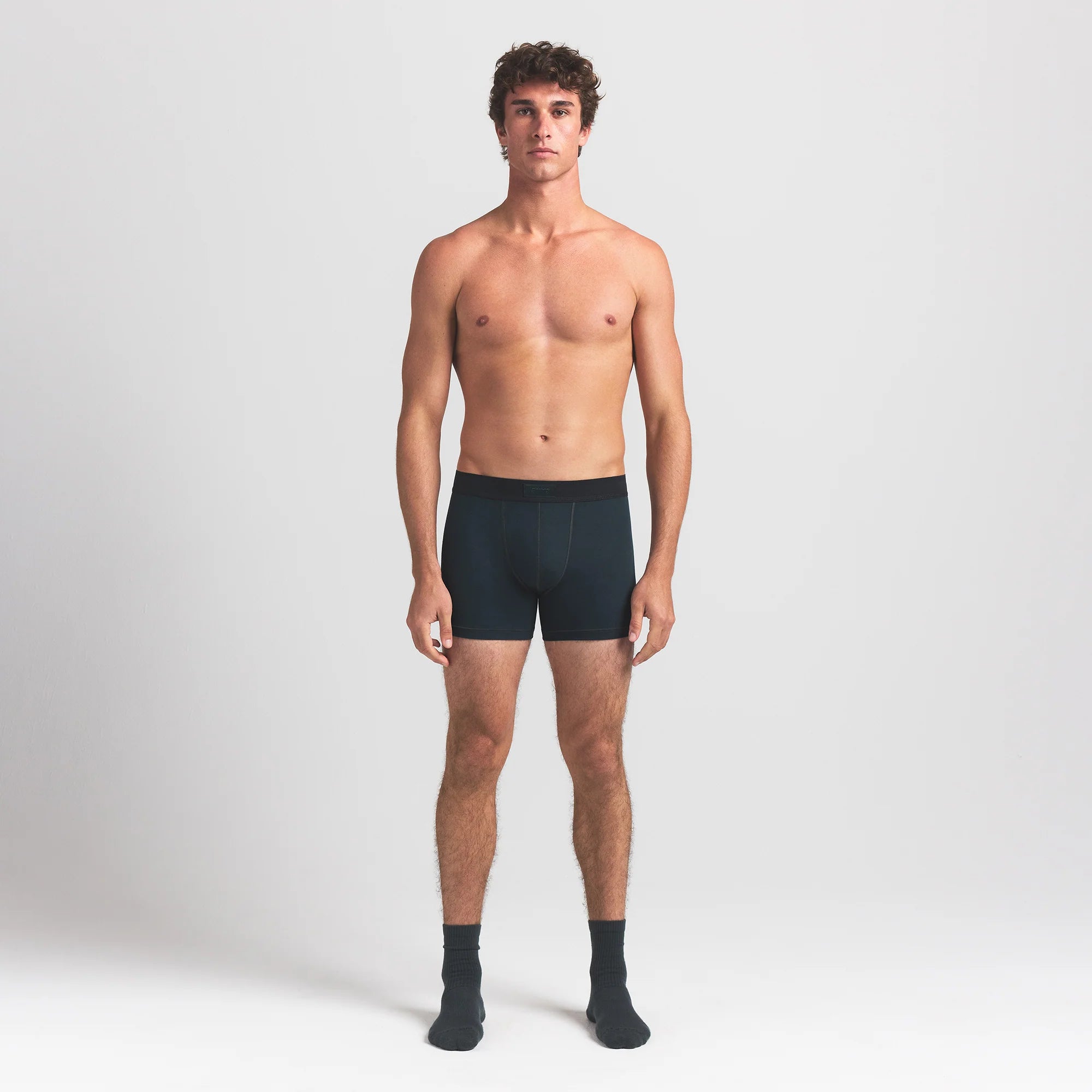 SKIMS COTTON MENS 3" BOXER BRIEF 3-PACK | VERDANT MULTI ON A MODEL FRONT VIEW @ | FOCUS: 0.0, 1.0, 0.9