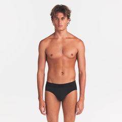 SKIMS COTTON MENS BRIEF 3-PACK | ONYX ON A MODEL FRONT VIEW