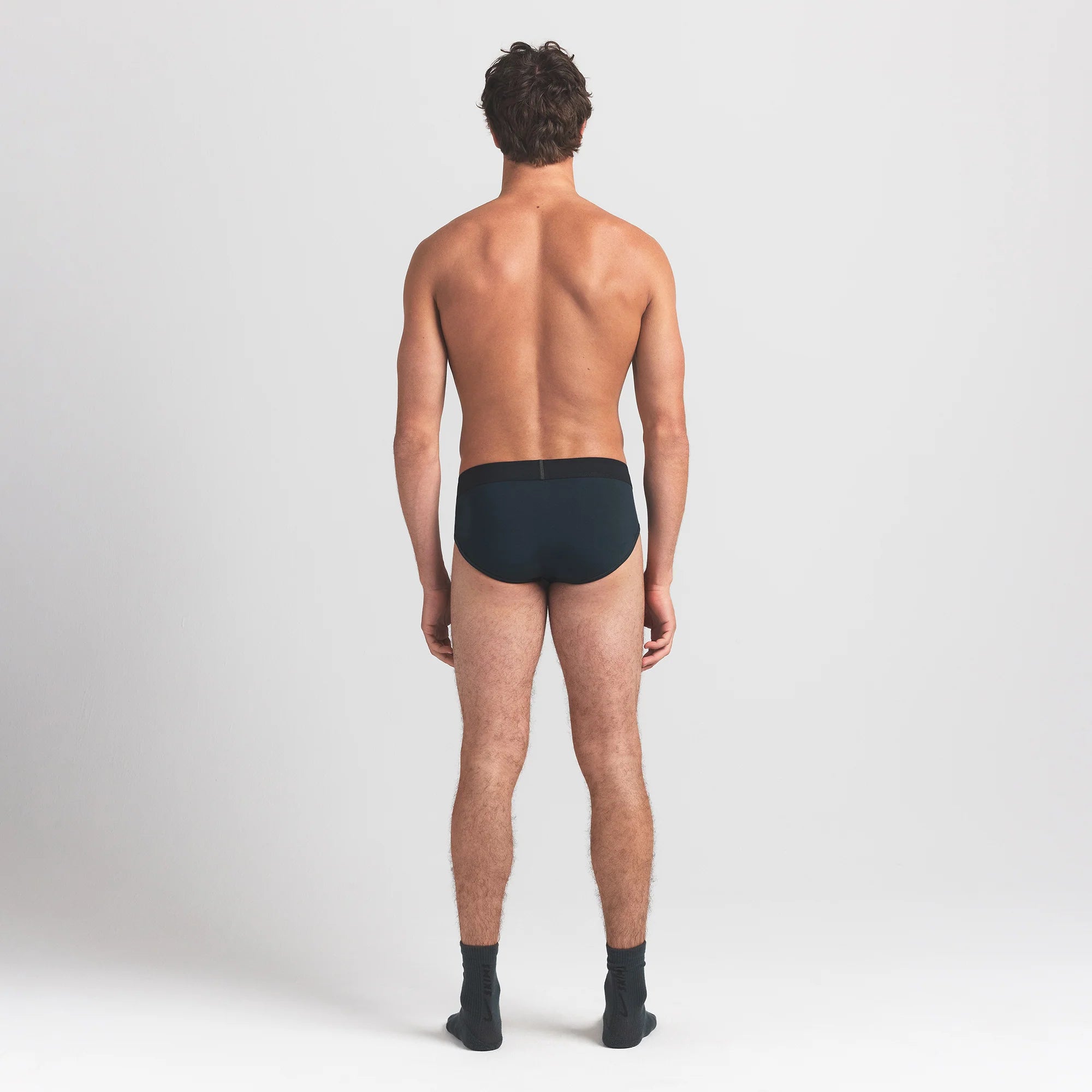 SKIMS COTTON MENS BRIEF 3-PACK | VERDANT MULTI ON A MODEL BACK VIEW @ | FOCUS: 0.0, 1.0, 0.9
