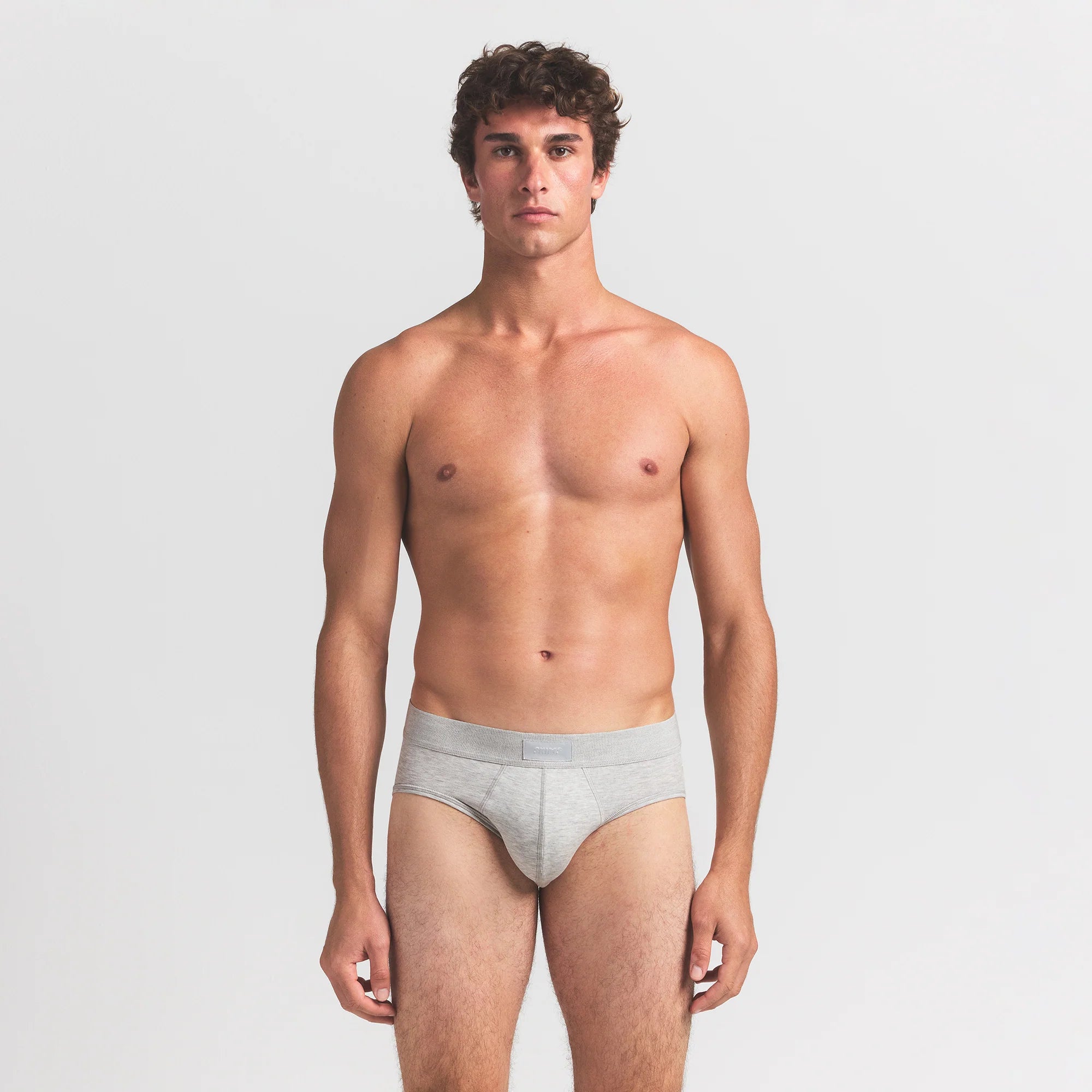 SKIMS COTTON MENS BRIEF 3-PACK | VERDANT MULTI ON A MODEL FRONT VIEW @ | FOCUS: 0.0, 1.0, 0.9