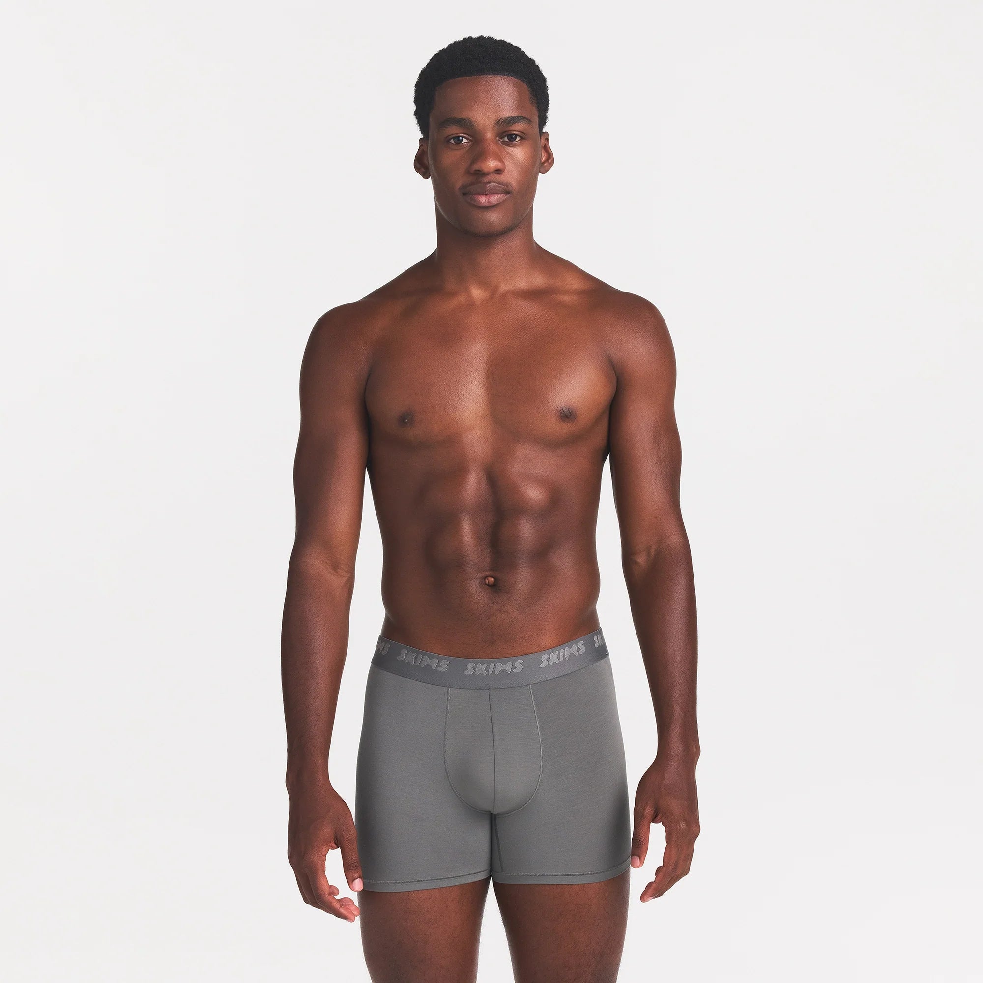 SKIMS STRETCH MENS 3" BOXER BRIEF | GUNMETAL ON A MODEL FRONT VIEW