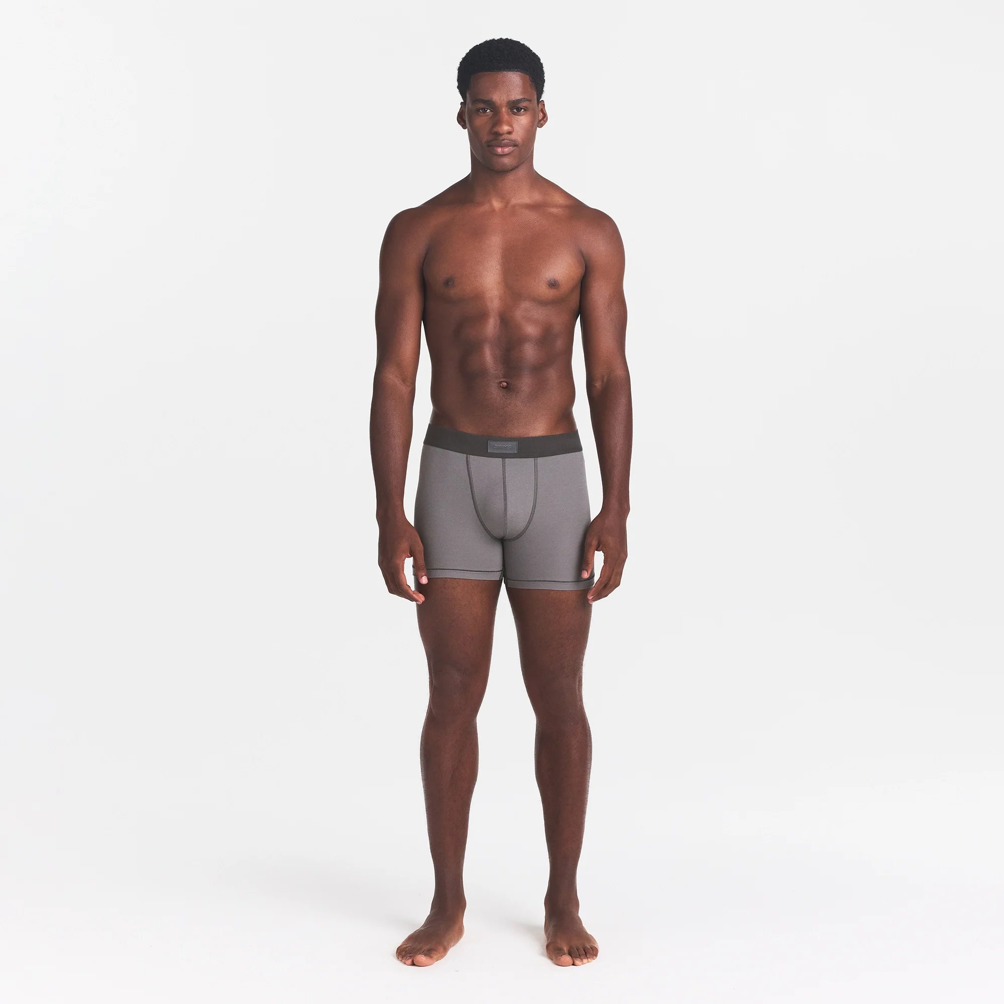 SKIMS COTTON MENS 3" BOXER BRIEF | WASHED GUNMETAL ON A MODEL FRONT VIEW @ | FOCUS: 0.0, 1.0, 0.9