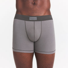 SKIMS COTTON MENS 3" BOXER BRIEF | WASHED GUNMETAL ON A MODEL FRONT VIEW