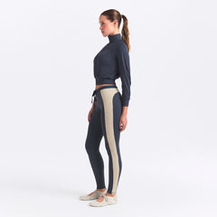 NikeSKIMS MATTE AND SHINE 26" LEGGING | DEEP ROYAL/STONE ON A MODEL SIDE VIEW @ | FOCUS: 0.0, 1.0, 0.9