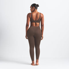 NikeSKIMS MATTE 26" LEGGING | DARK SEPIA ON A MODEL BACK VIEW