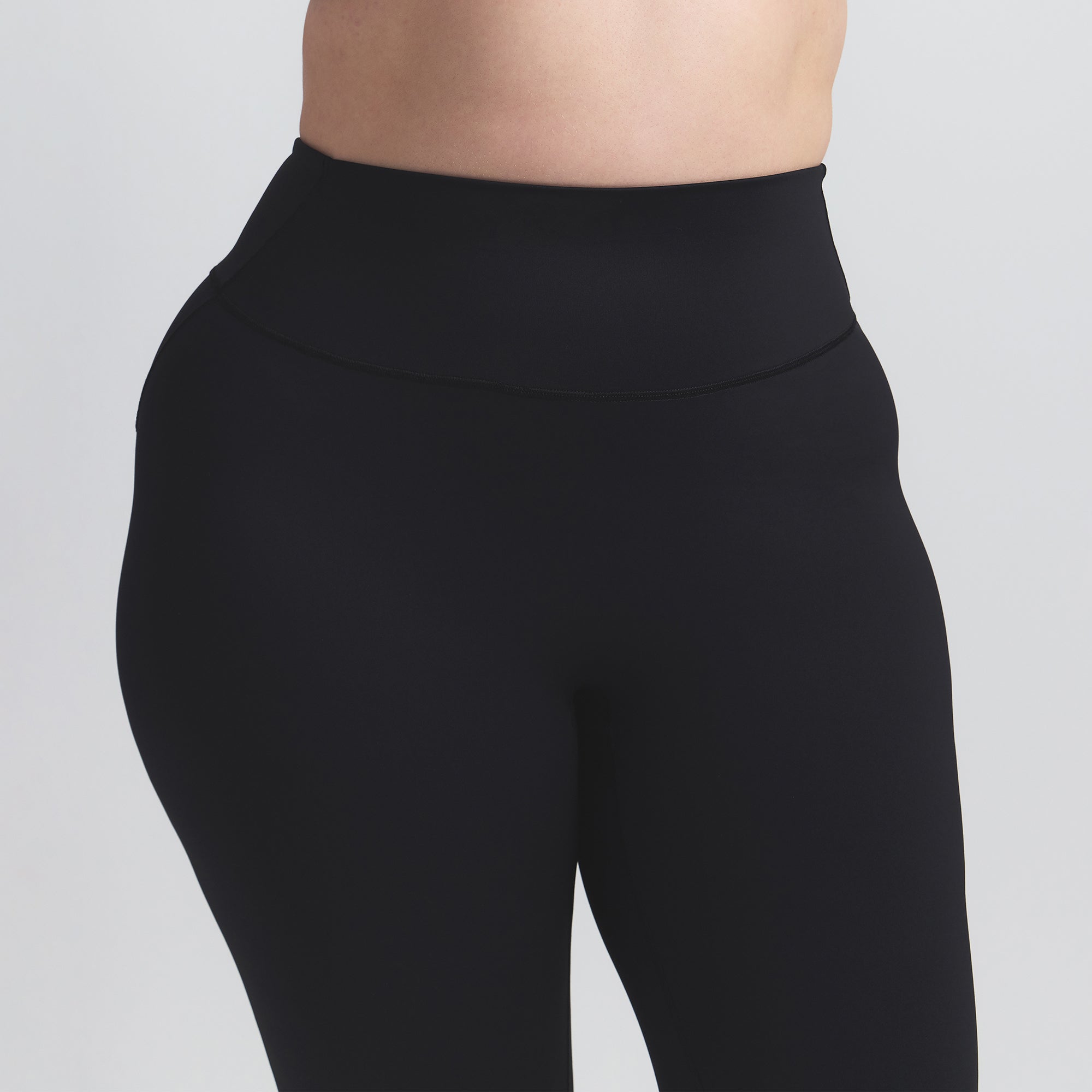 NikeSKIMS MATTE 26" LEGGING | OBSIDIAN ON A MODEL FRONT VIEW