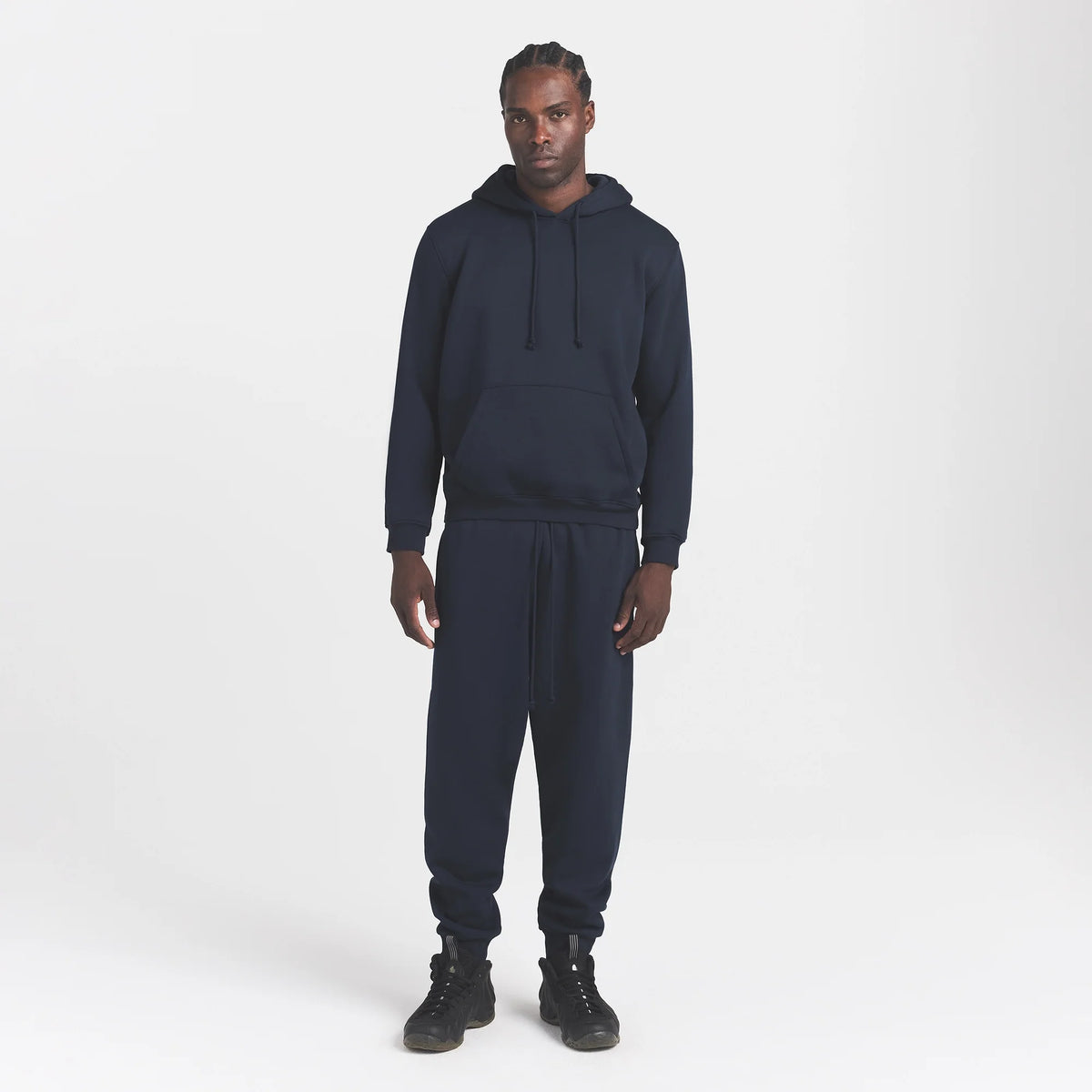 FLEECE LOUNGE MENS TAPERED JOGGER | NAVY ON A MODEL FRONT VIEW @ | FOCUS: 0.0, 1.0, 0.9