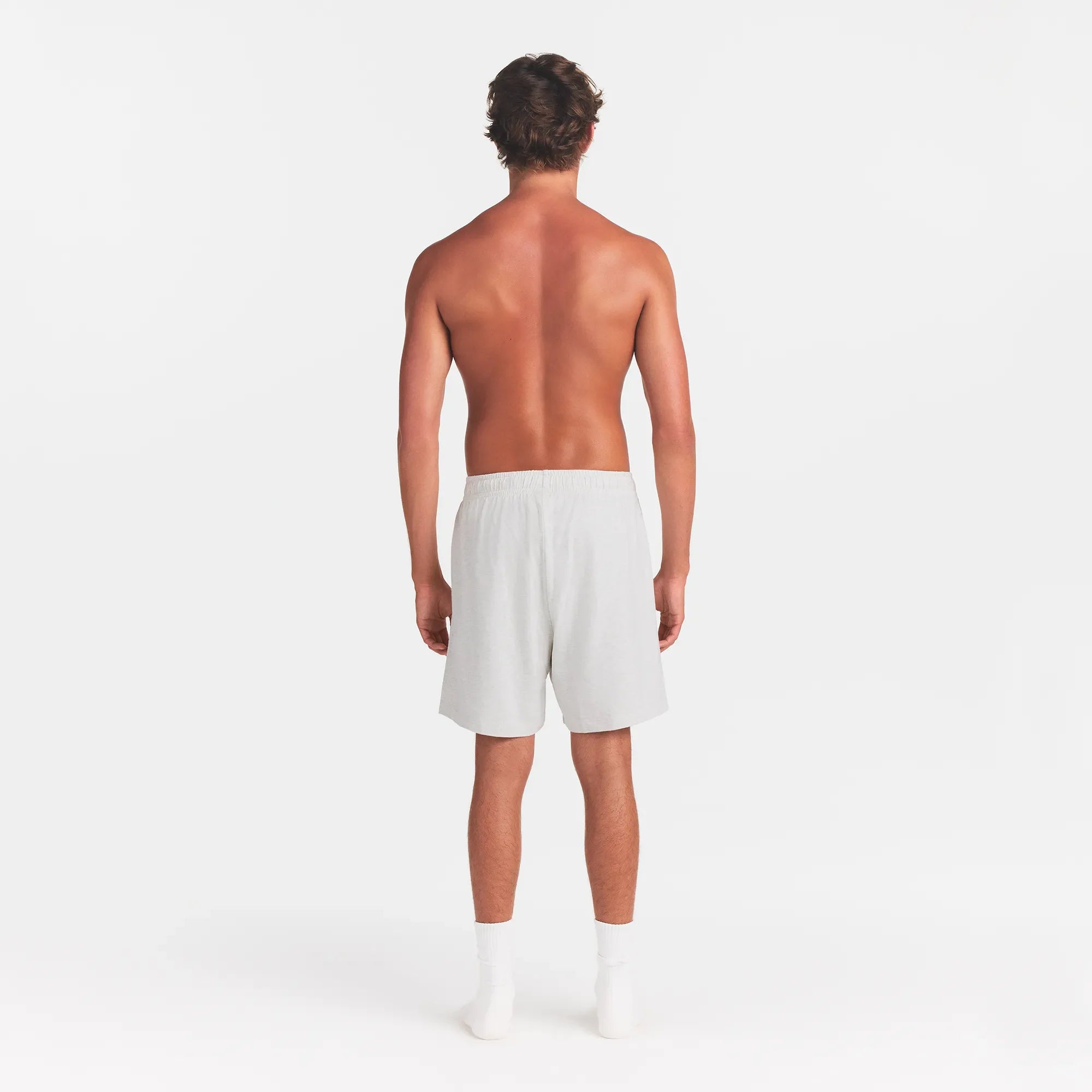 JERSEY LOUNGE MENS RELAXED SHORT | CHALK HEATHER ON A MODEL BACK VIEW @ | FOCUS: 0.0, 1.0, 0.9