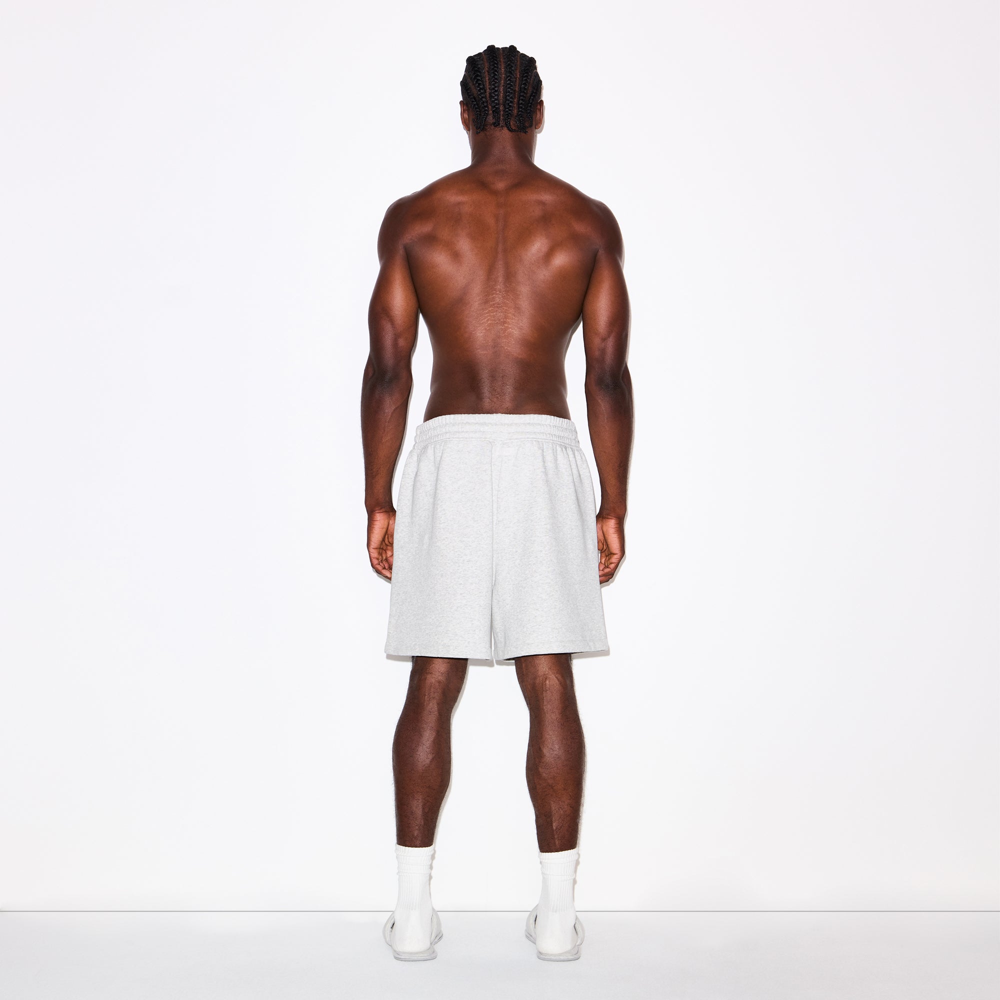 FLEECE LOUNGE MENS RELAXED SHORT | LIGHT HEATHER GREY ON A MODEL FRONT VIEW @ | FOCUS: 0.0, 1.0, 0.9