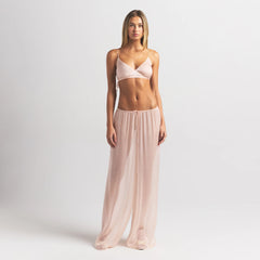 SKIMS ROMANCE SKIMPY WRAP BRALETTE | PRIMROSE ON A MODEL FRONT VIEW @ | FOCUS: 0.0, 1.0, 0.9