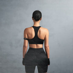 NikeSKIMS SHINE RACER BACK BRA | OBSIDIAN ON A MODEL SIDE VIEW @ | FOCUS: 0.0, 1.0, 0.9