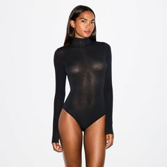SHEER MODAL LONG SLEEVE TURTLENECK BODYSUIT | ONYX ON A MODEL FRONT VIEW @ | FOCUS: 0.0, 1.0, 0.9