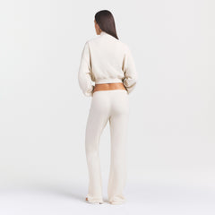 DRAPEY FRENCH TERRY STRAIGHT LEG PANT | BUFF ON A MODEL SIDE VIEW @ | FOCUS: 0.0, 1.0, 0.9
