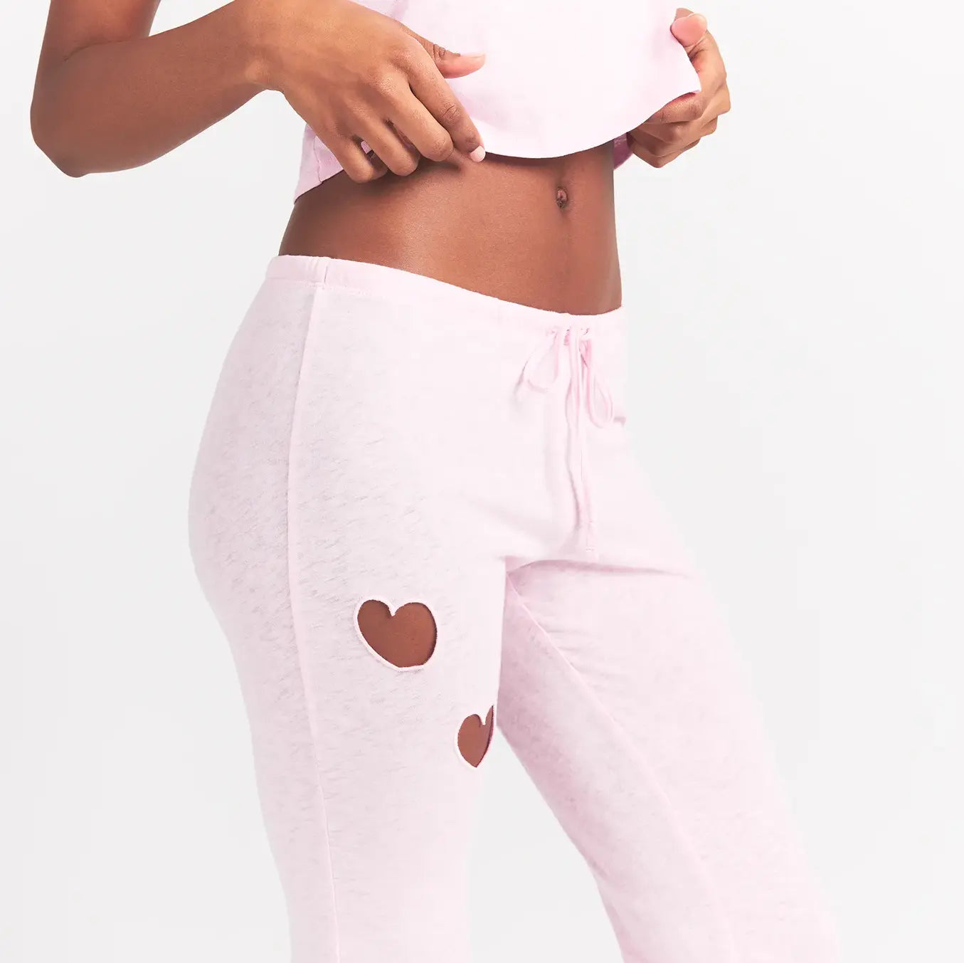 WORN IN JERSEY HEART STRAIGHT LEG PANT | BABY PINK ON A MODEL SIDE VIEW @ | FOCUS: 0.0, 1.0, 0.9