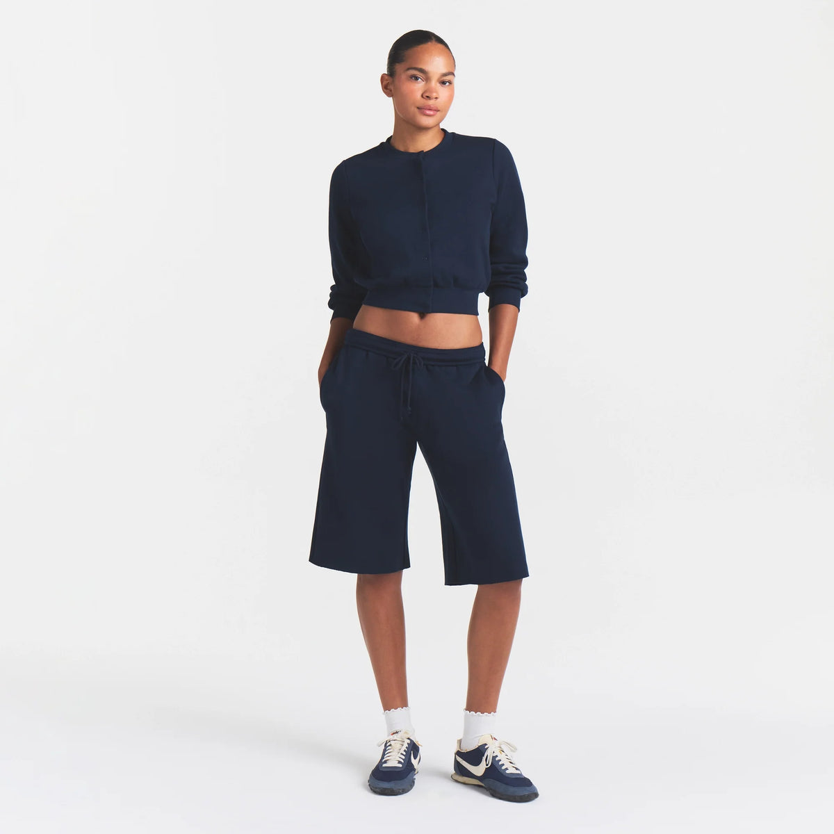 COTTON FLEECE LONG SHORT | NAVY ON A MODEL FRONT VIEW @ | FOCUS: 0.0, 1.0, 0.9