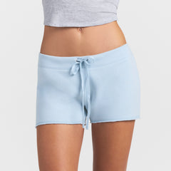 DRAPEY FRENCH TERRY SHORT | POWDER BLUE ON A MODEL SIDE VIEW @ | FOCUS: 0.0, 1.0, 0.9