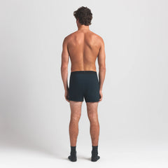 SKIMS COTTON MENS KNIT BOXER | VERDANT ON A MODEL BACK VIEW @ | FOCUS: 0.0, 1.0, 0.9