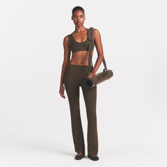 NikeSKIMS MATTE DOUBLE STRAP SCOOP BRA | DARK SEPIA ON A MODEL FRONT VIEW @ | FOCUS: 0.0, 1.0, 0.9