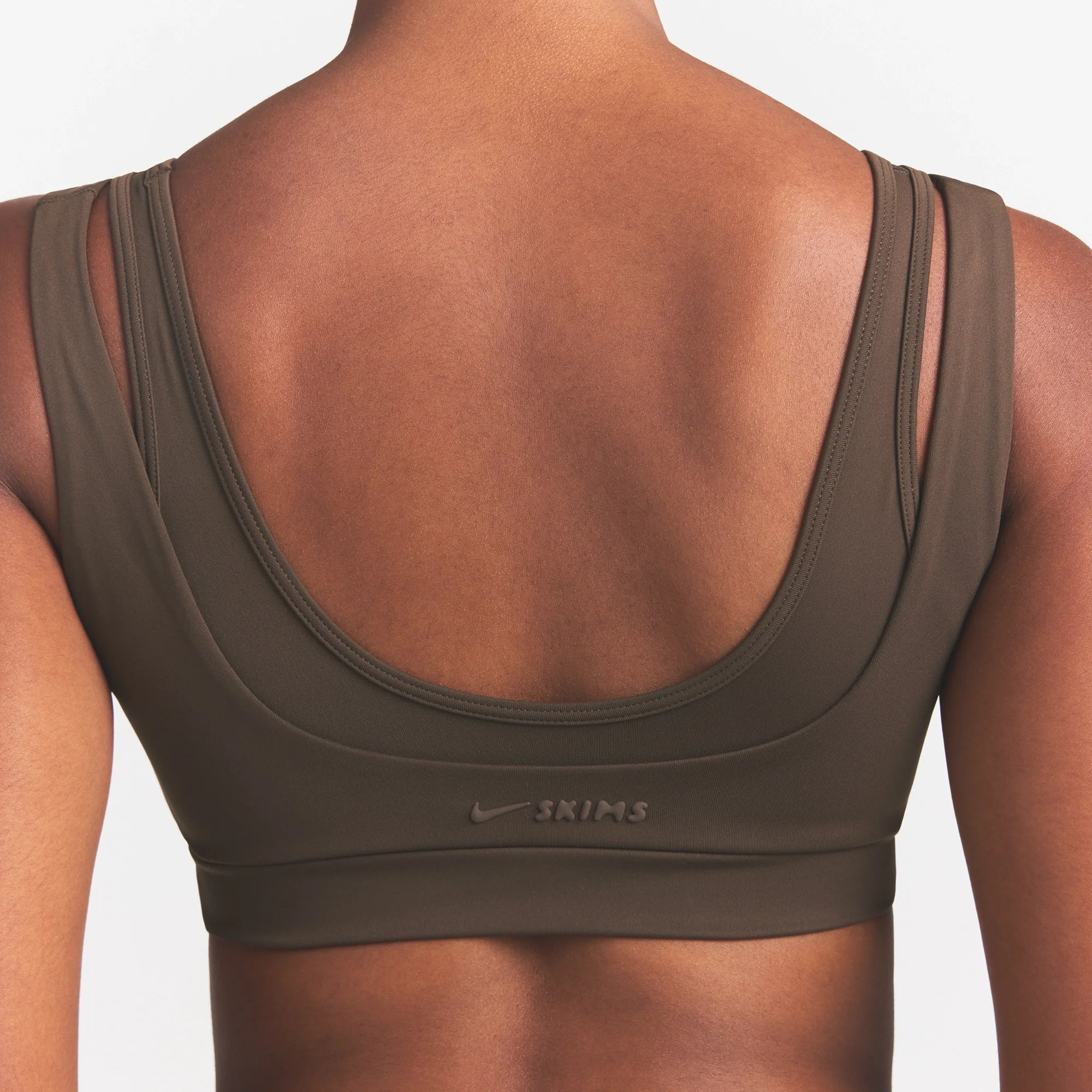 NikeSKIMS MATTE DOUBLE STRAP SCOOP BRA | DARK SEPIA ON A MODEL FRONT VIEW @ | FOCUS: 0.0, 1.0, 0.9