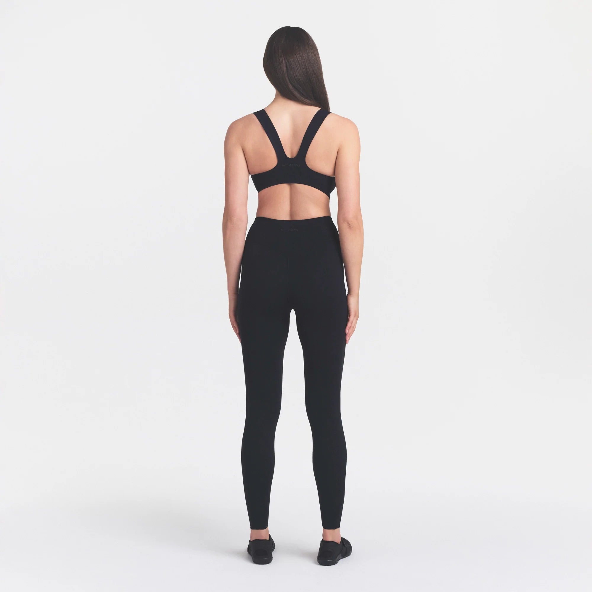 NikeSKIMS STUDIO STRETCH 26" LEGGING | OBSIDIANON A MODEL FRONT