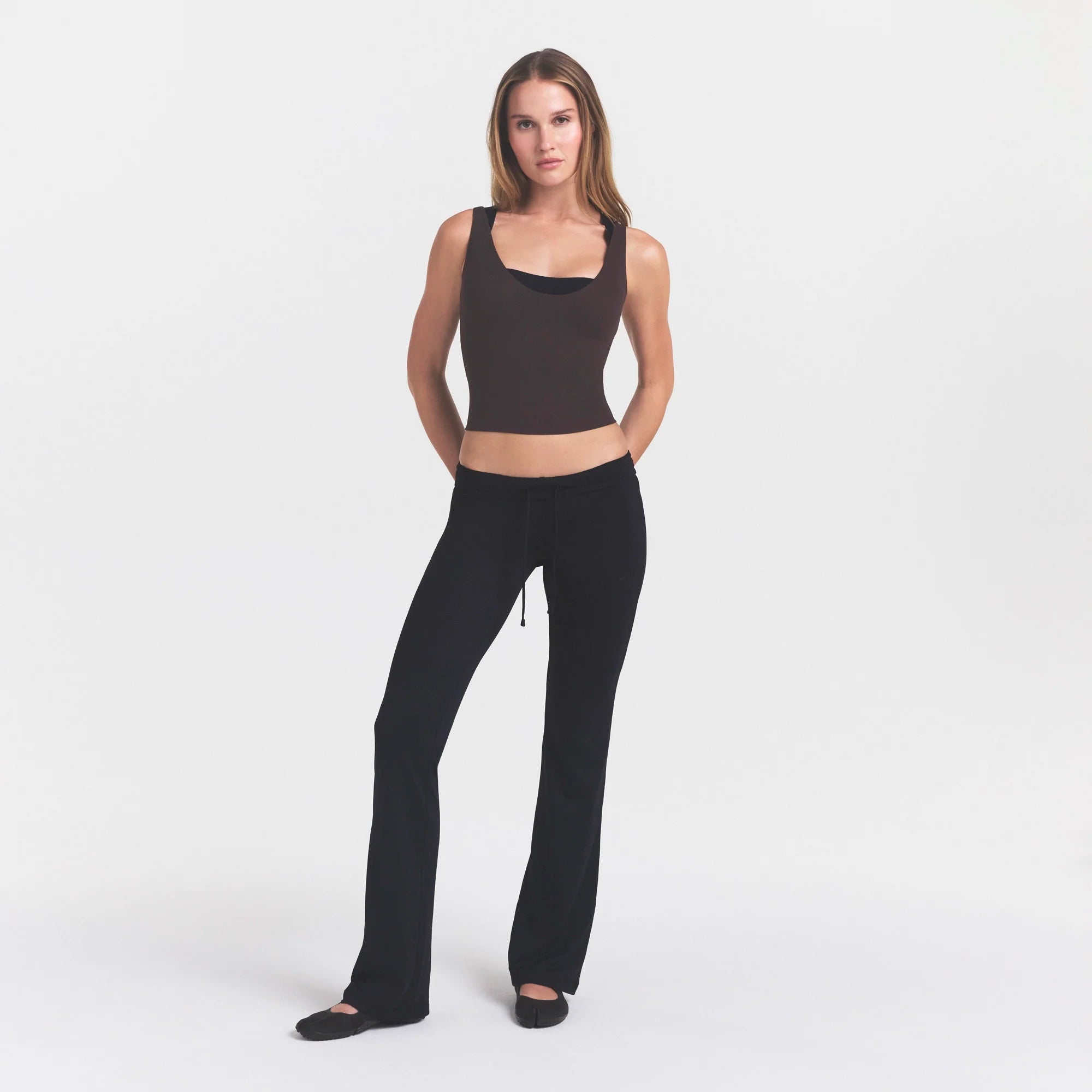 NikeSKIMS STUDIO STRETCH PLUNGE TANK | DARK ROASTON A MODEL FRONT