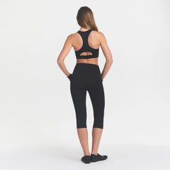 NikeSKIMS MATTE CROP 17" LEGGING | OBSIDIAN ON A MODEL BACK VIEW @ | FOCUS: 0.0, 1.0, 0.9