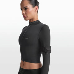 NikeSKIMS ACCESSORIES ARMBAND | OBSIDIAN ON A MODEL FRONT VIEW @ | FOCUS: 0.0, 1.0, 0.9
