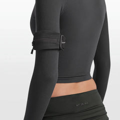 NikeSKIMS ACCESSORIES ARMBAND | OBSIDIAN ON A MODEL FRONT VIEW @ | FOCUS: 0.0, 1.0, 0.9