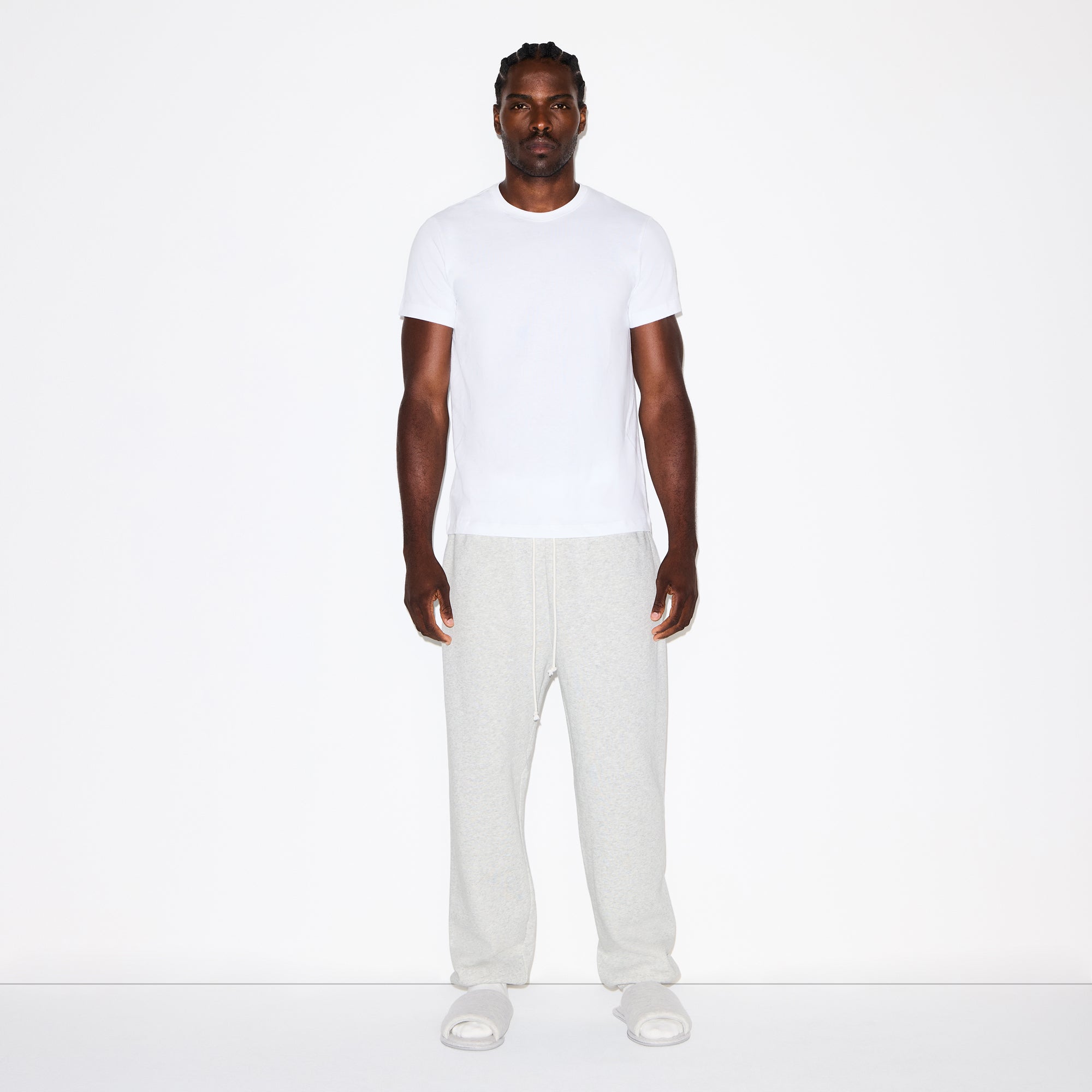 FLEECE LOUNGE MENS RELAXED JOGGER | LIGHT HEATHER GREY ON A MODEL FRONT VIEW @ | FOCUS: 0.0, 1.0, 0.9