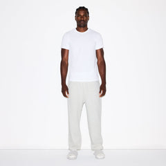 FLEECE LOUNGE MENS RELAXED JOGGER | LIGHT HEATHER GREY ON A MODEL FRONT VIEW @ | FOCUS: 0.0, 1.0, 0.9