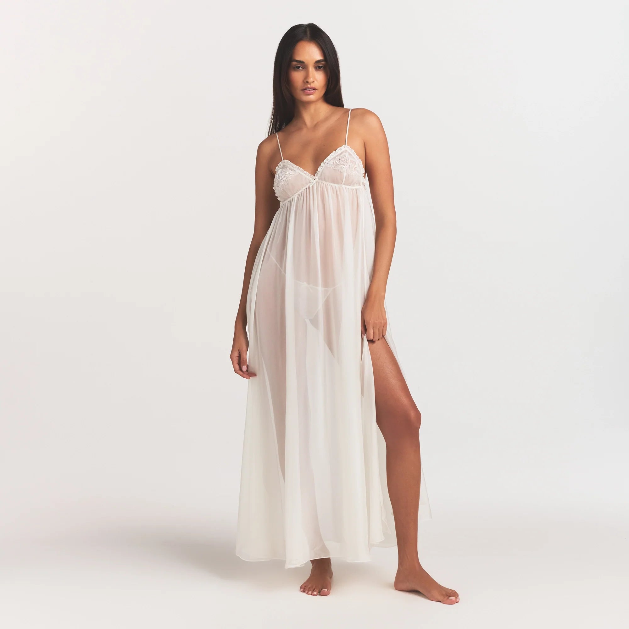 SKIMS ROMANCE LONG SLIP | IVORY ON A MODEL FRONT VIEW @ | FOCUS: 0.0, 1.0, 0.9
