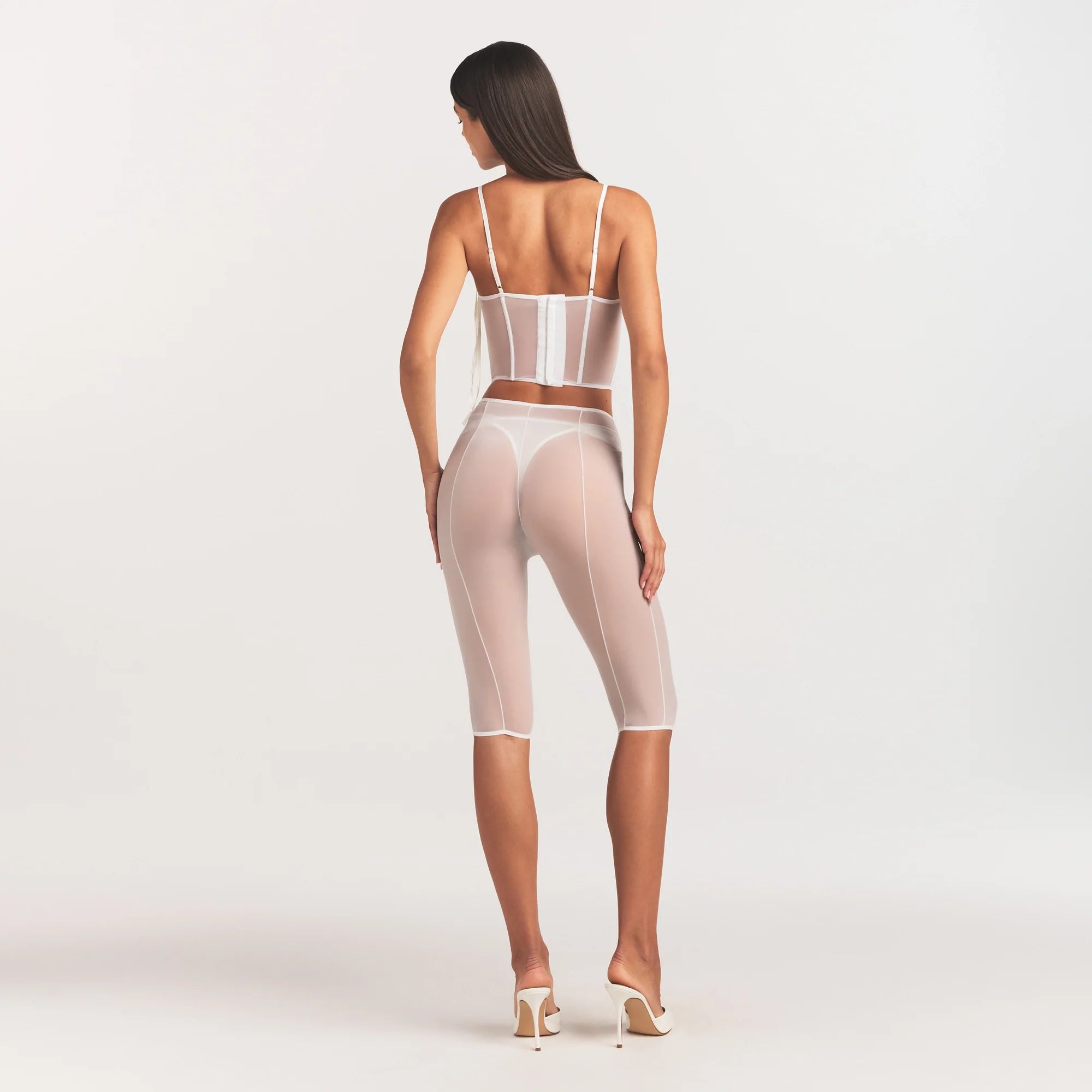 ULTRA FINE MESH BOW CORSET | IVORY ON A MODEL FRONT VIEW @ | FOCUS: 0.0, 1.0, 0.9