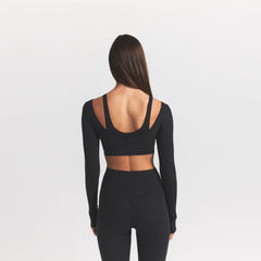 WOOL RIB LONG SLEEVE SUPER CROPPED TOP | OBSIDIAN ON A MODEL BACK VIEW S | FOCUS: 0.0, 1.0, 0.9