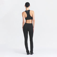 NikeSKIMS RIBBED SEAMLESS RACER FRONT BRA | OBSIDIAN ON A MODEL FRONT VIEW