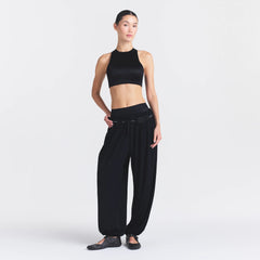 NikeSKIMS SATIN SHINE HIGH NECK BRA | OBSIDIAN ON A MODEL FRONT VIEW @ | FOCUS: 0.0, 1.0, 0.9