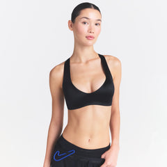 NikeSKIMS SATIN SHINE PLUNGE T-BACK BRA| OBSIDIAN ON A MODEL SIDE VIEW @ | FOCUS: 0.0, 1.0, 0.9