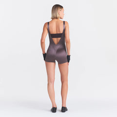 NikeSKIMS SATIN SHINE SUSPENDER 2.5" ONESIE | RESIN ON A MODEL FRONT VIEW