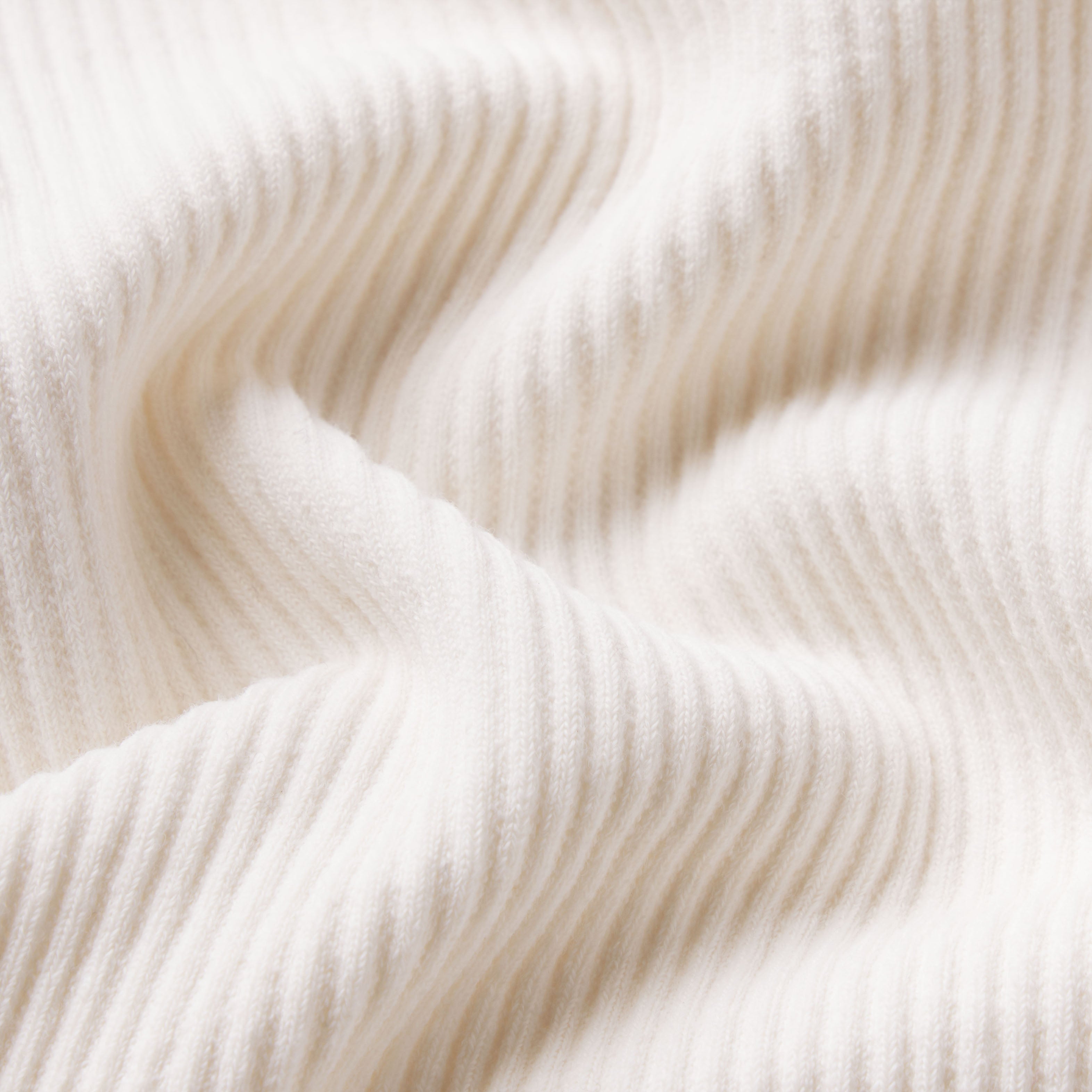 NikeSKIMS RIBBED SEAMLESS CAMI | IVORY & LAYS FLAT ON A WHITE BACKGROUND | FLT