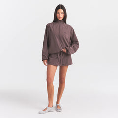 NikeSKIMS STRETCH NYLON OVERSIZED JACKET | RESIN ON A MODEL FRONT VIEW @ | FOCUS: 0.0, 1.0, 0.9