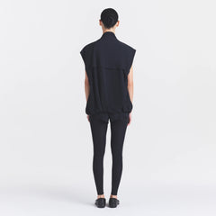 NikeSKIMS STRETCH NYLON OVERSIZED VEST | OBSIDIAN ON A MODEL FRONT VIEW @ | FOCUS: 0.0, 1.0, 0.9