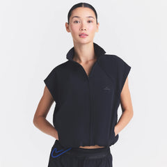 NikeSKIMS STRETCH NYLON OVERSIZED VEST | OBSIDIAN ON A MODEL SIDE VIEW @ | FOCUS: 0.0, 1.0, 0.9