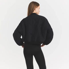 NEOPRENE OUTERWEAR REVERSIBLE BOMBER JACKET | OBSIDIAN ON A MODEL BACKVIEW @ | FOCUS: 0.0, 1.0, 0.9