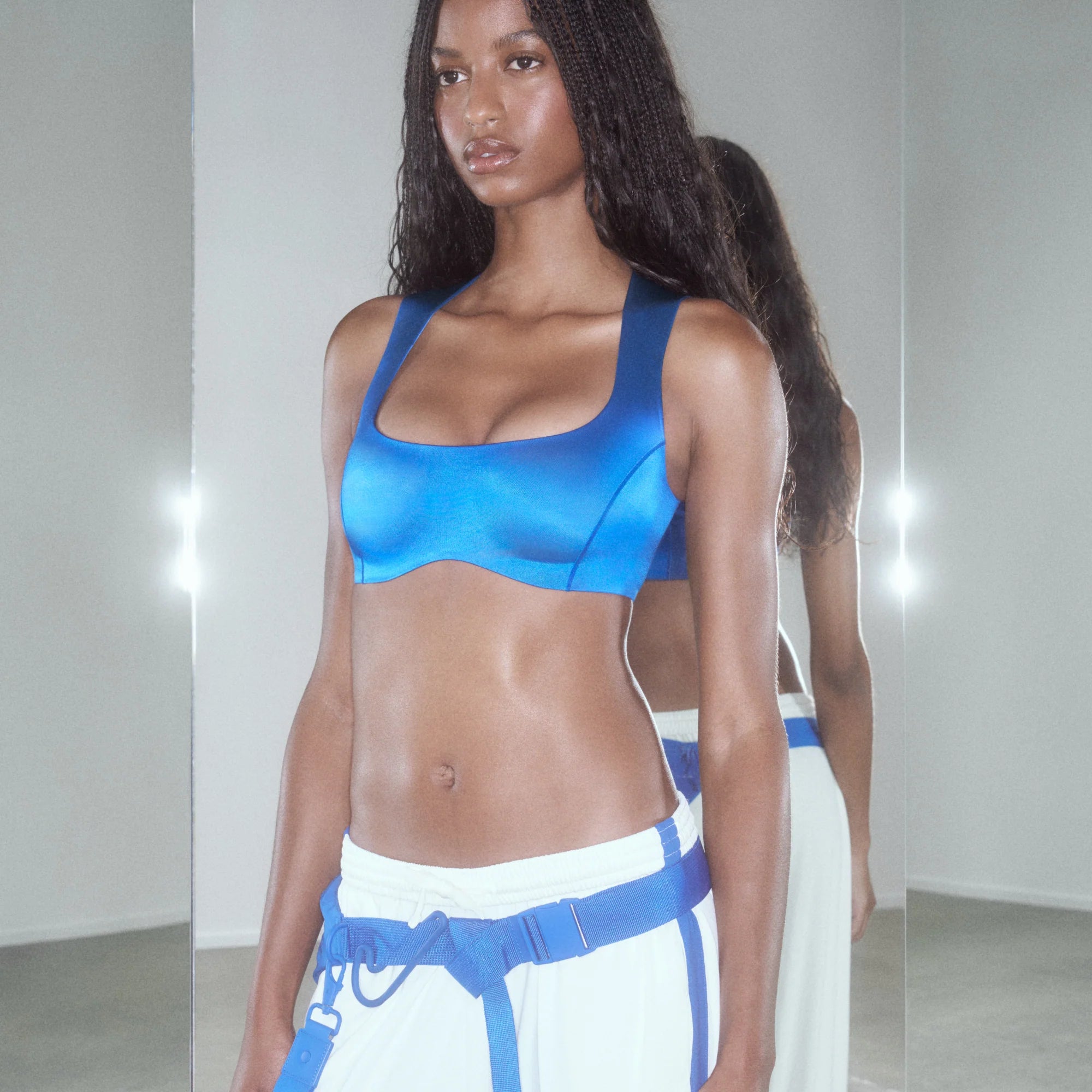 NikeSKIMS SATIN SHINE WIDE SCOOP BRA | COBALT & LAYS FLAT ON A WHITE BACKGROUND | FLT